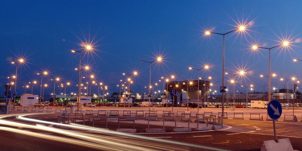 Lanterns at shopping mall parking lot illuminated at night